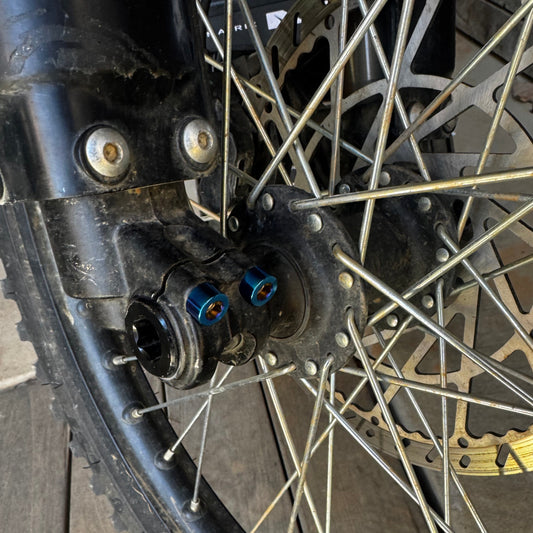 Titanium Talaria front axel pinch bolts